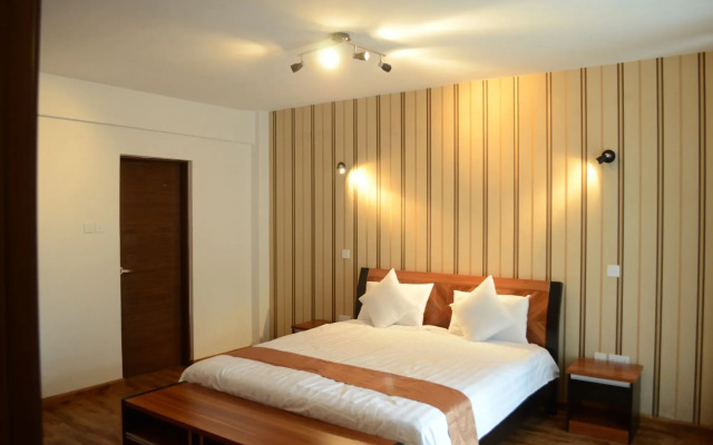 WE Hotel and Suites
