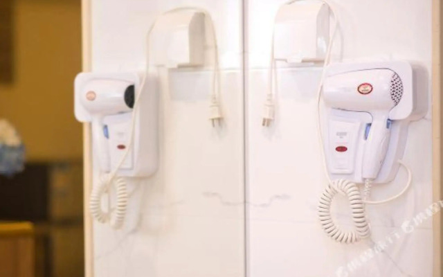 Manfei Theme Apartment (Meizhou wanda plaza Branch)