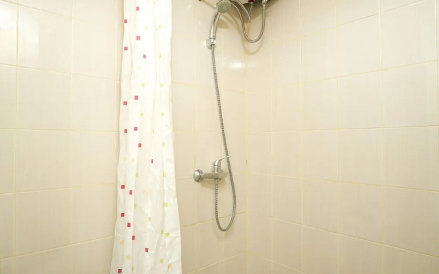 Simply White and Compact Studio at Amethyst Apartment