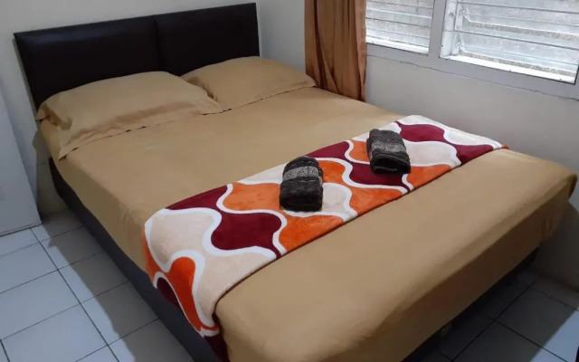 Spot On 3988 Kost Carmelia Baranangsiang Syariah