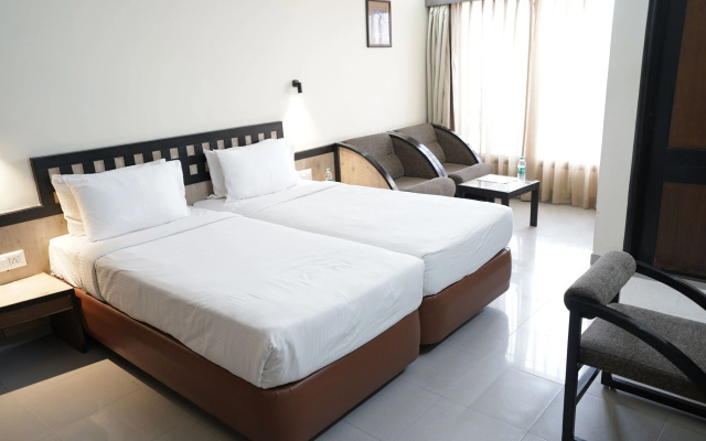 Metropolis Hotel – Guest Rooms – Hubli