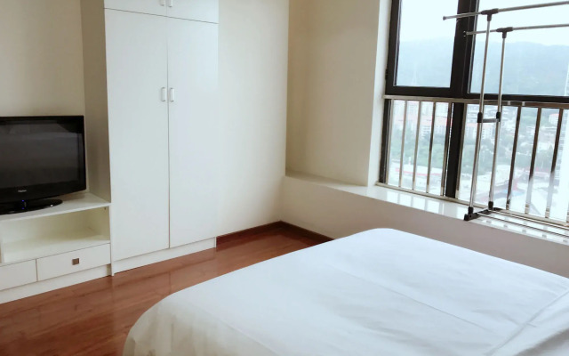 Xingyue Apartment Luogang Wanda