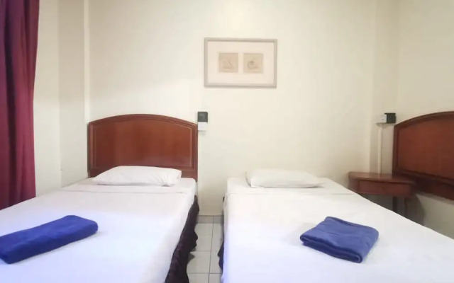 OYO 90061 Kuhara Court Apartment Suite