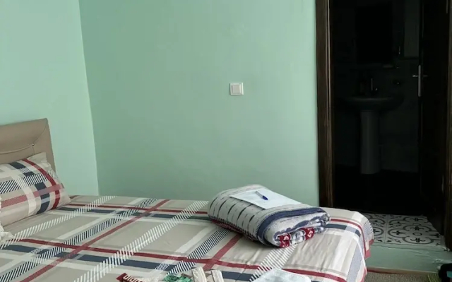 Mavi Ladin Konukevi