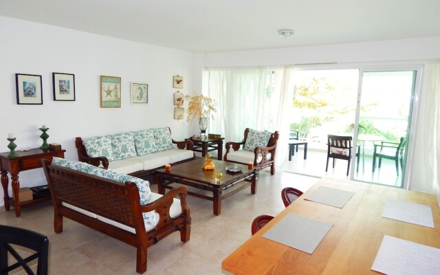 Sunny apartment at the beach with pool