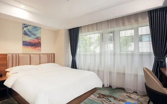 Ruigu Bussiness Hotel