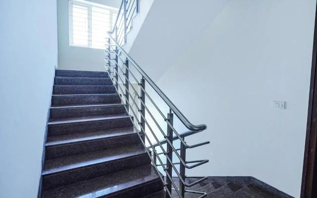 FabHotel Home Tree Service Apartment