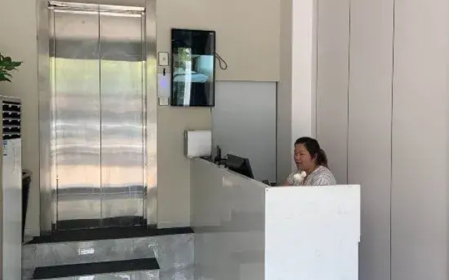 Linquan Aixin Hotel