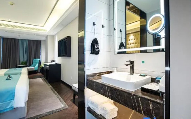 Xana Hotelle Hotel (Zhumadian Gaotie Xizhan)
