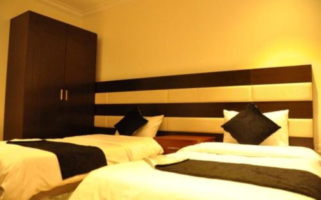 Holiday Plus Hotel Suites