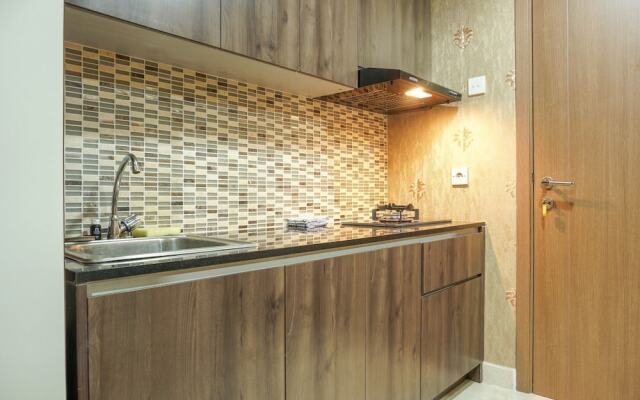 Warm and Cozy Studio at Puri Orchard Apartment