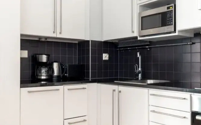 2ndhomes Stylish 1BR Apt w Sauna&Balcony
