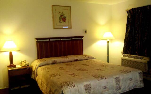 Maple Inn & Suites