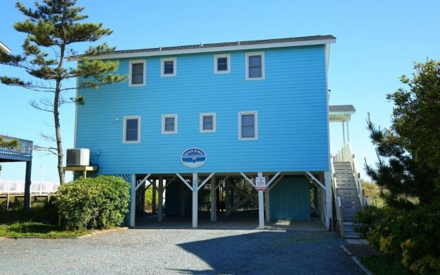 Windchimes 4 Bedroom Home by RedAwning