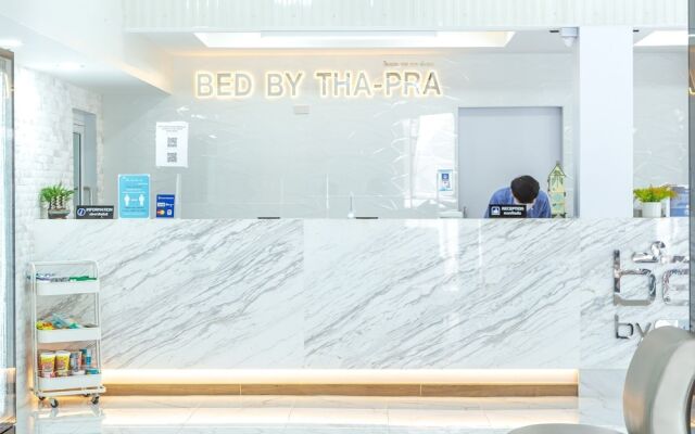 Bed by Tha-Pra Hotel and Apartment