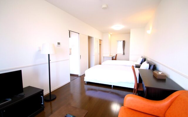 Resort Class Inn Onna