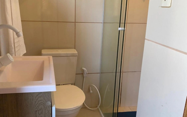 Casa de mãe aconchegante com piscina próximo à praia