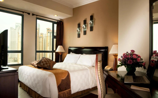 Grand Tropic Suites Hotel