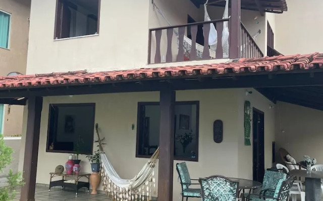 Quarto na praia com cama de casal