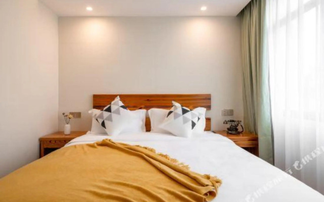 Echarm Hotel (Haikou Shangbang Baihui City Haiken Plaza)