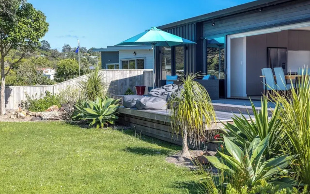 The Golden Pohutukawa Beach House