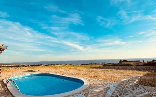 Beautiful secluded area near Novalja vacation house with pool and sea view Villa Lara