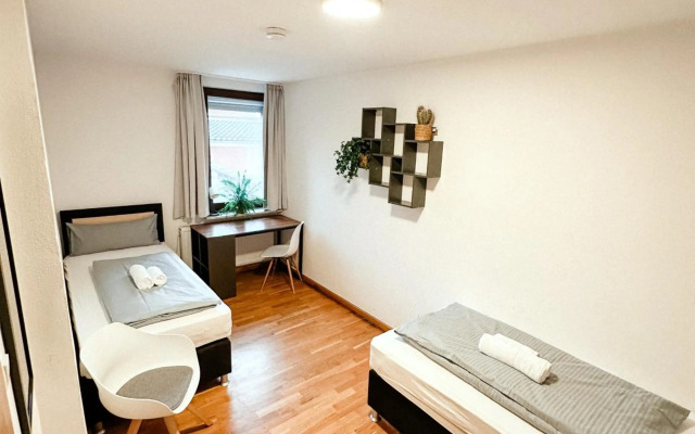 Suiteable Living - Boardinghaus mit Parkplätzen, WLAN und Waschraum