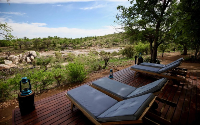 Ivory Wilderness River Rock Lodge