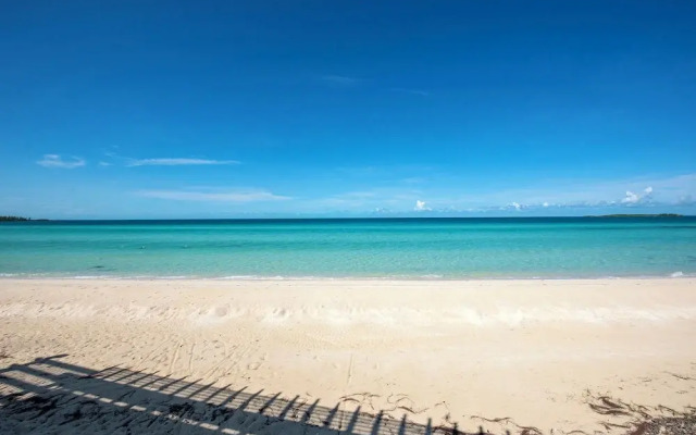 Secluded Luxury: New Beachfront Home With Pool