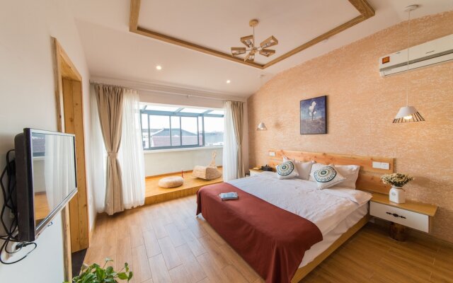 Wuzhen woxingwosu Hotel