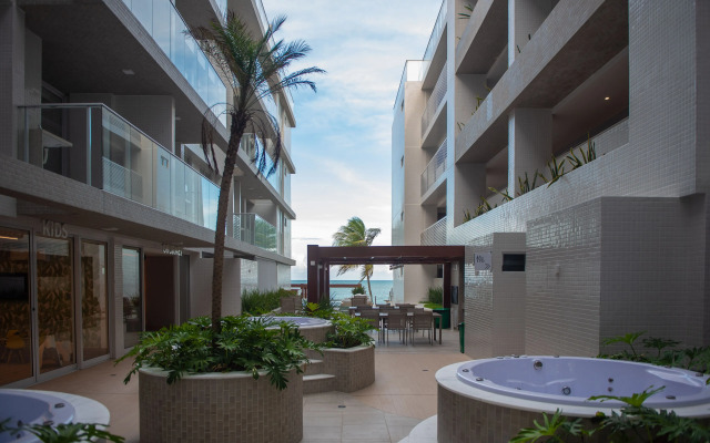 Pé na areia do Caribessa - Branco Haus