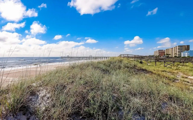 Newly Remodeled Oceanfront Condo with Salt Water Pool and Private Walkway to Beach by RedAwning