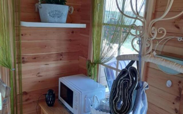 Log cabin retreat and luxury bell tent