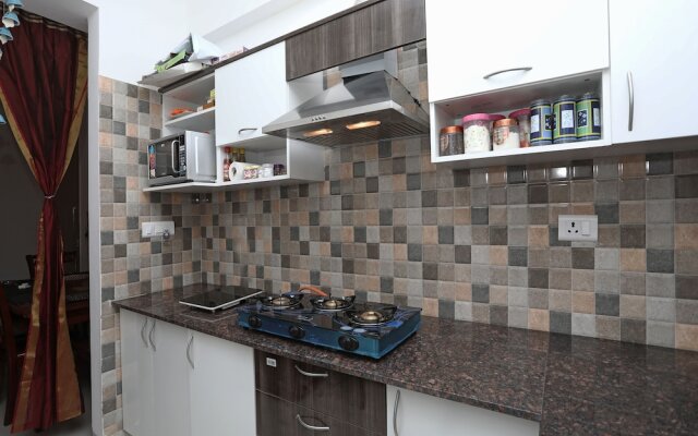 OYO 13172 Home Exotic 1BHK Pacific Golf Estate