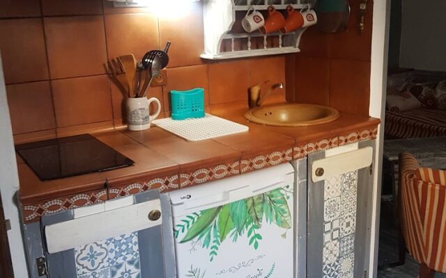 Little House With Fireplace And Terrace In Natural Environment