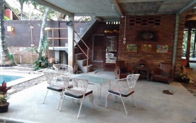 Omah Kulon Cabins and Pool