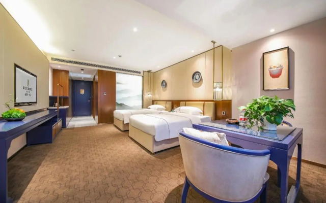 Rezen Heyi Hotel Yizhang