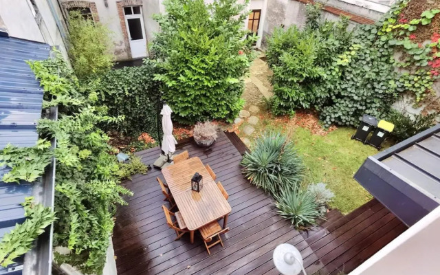 Maison de ville avec terrasse et jardin