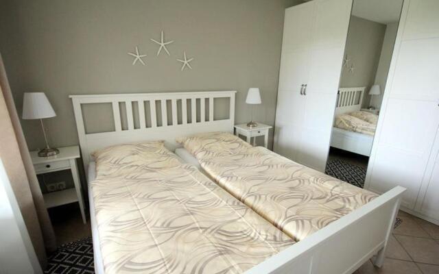 Ferienwohnung-9-mit-Terrasse-Garten-Landhaus-Hubertus-Duhnen