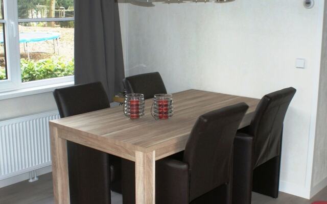 Modern chalet with two terraces and near a pond