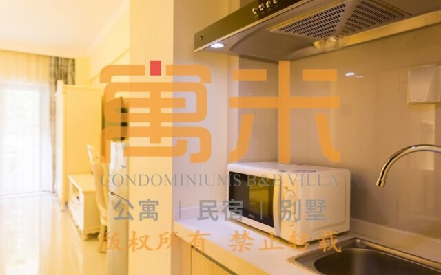 Yumi Apartment Xishuangbaina Branch