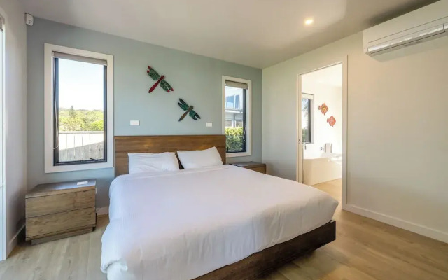 The Golden Pohutukawa Beach House