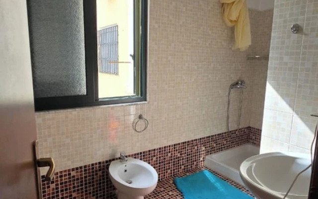 Tirent Apartment - Cozy Bedrooms Stay by Golem Beach.