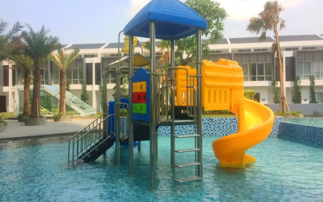 Homey and Modern 2BR Puri Mansion Apartment