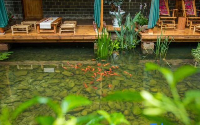 Puzhehei Yidu Homestay (Hehua Daguan Garden)