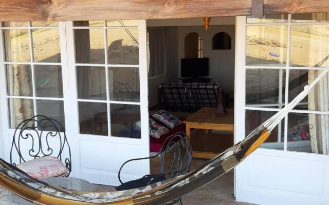 Beach apartment in front of the sea