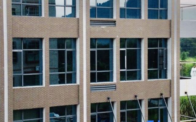 Xingfuli Xilai Holiday Apartment