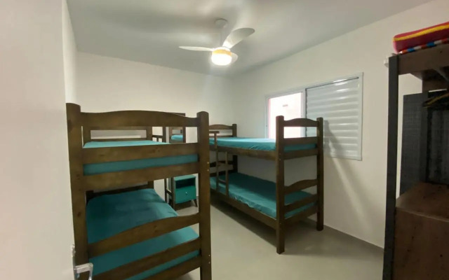 Casa em Bertioga condomínio 250 metros da praia