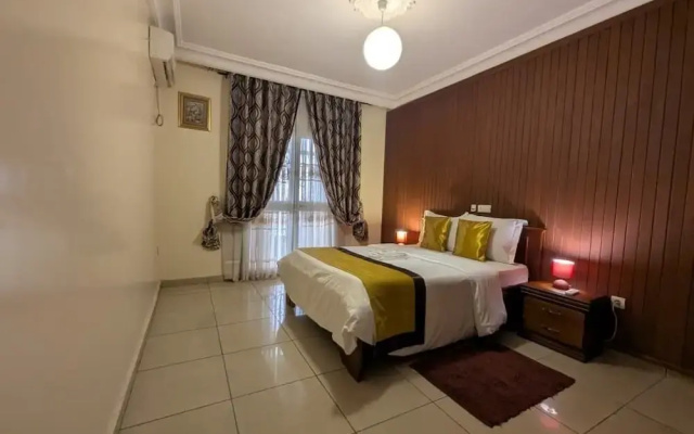 Appart'hôtel Micheline Suites Bastos