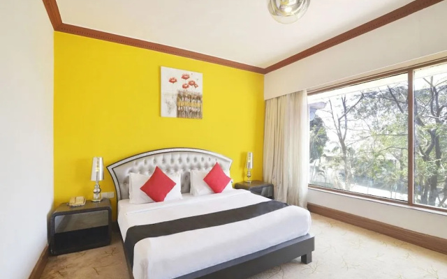 Capital O 29124 Royal Palms Hotel